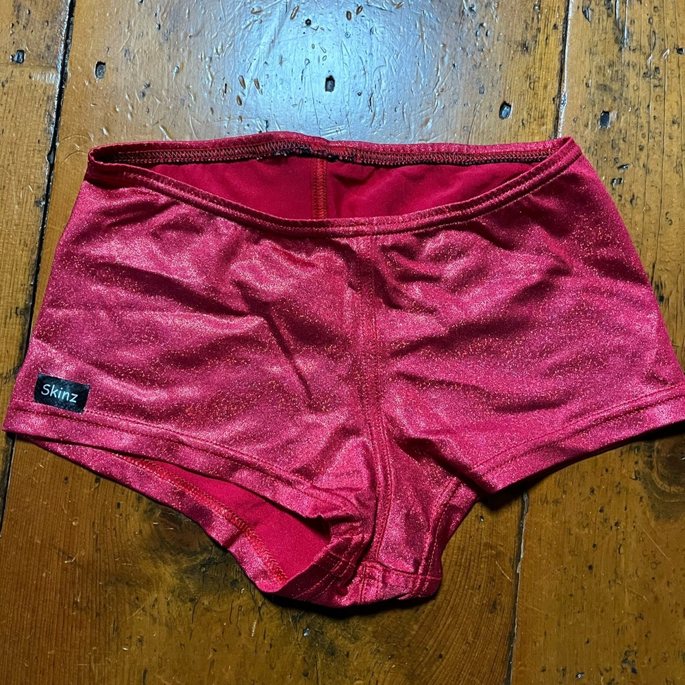 Derby Skinz medium roller derby booty shorts dance gymnastics red sparkly